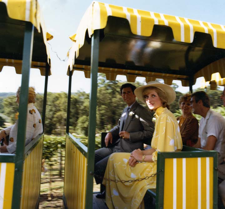 from the Queensland State Archives. Digital Image ID 7998. Item ID 1460350. of HRH Prince Charles, The Prince of Wales, and HRH Princess Diana, The Princess of Wales, during their visit to Sunshine Plantation in 1983.